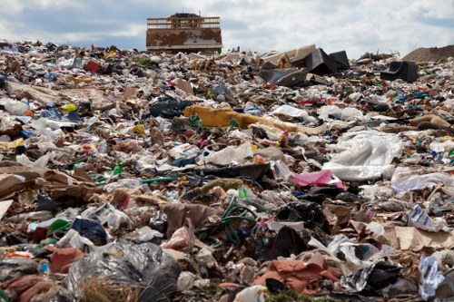 Workers sorting recyclables for business waste in Hillingdon